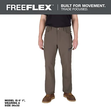 Milwaukee M651N-3432, unpowered: Men's 34 in. x 32 in. Brown FREEFLEX Tech Work Pants with 7 Pockets (photograph from the Home Depot listing)